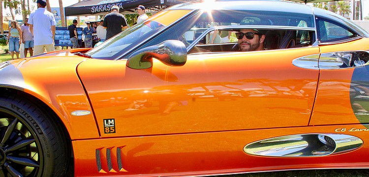 Joseph Staskowski from Car Cave SRQ presented a strikingly orange, Dutch-manufactured 2010 Spyker C8 Laviolette LM85 at the Exotic Cars on the Circle show on Sept. 6 on St. Armands Circle.