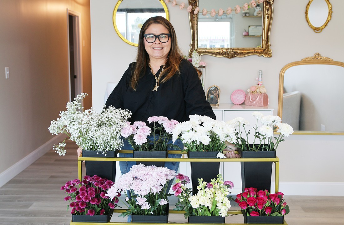 Yvonne McCutchen first opened The Flower Bar about three years ago. Photo by Jarleene Almenas
