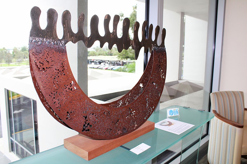 Pamela Olin, an artist working in 3D media, presented multiple metalwork sculptures at the Sept. 9 art exhibition at Plymouth Harbor, including this dynamic piece titled 