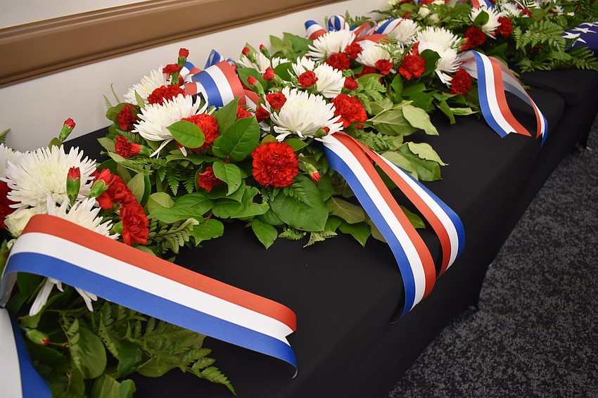 Wreaths are set out for the ceremony.