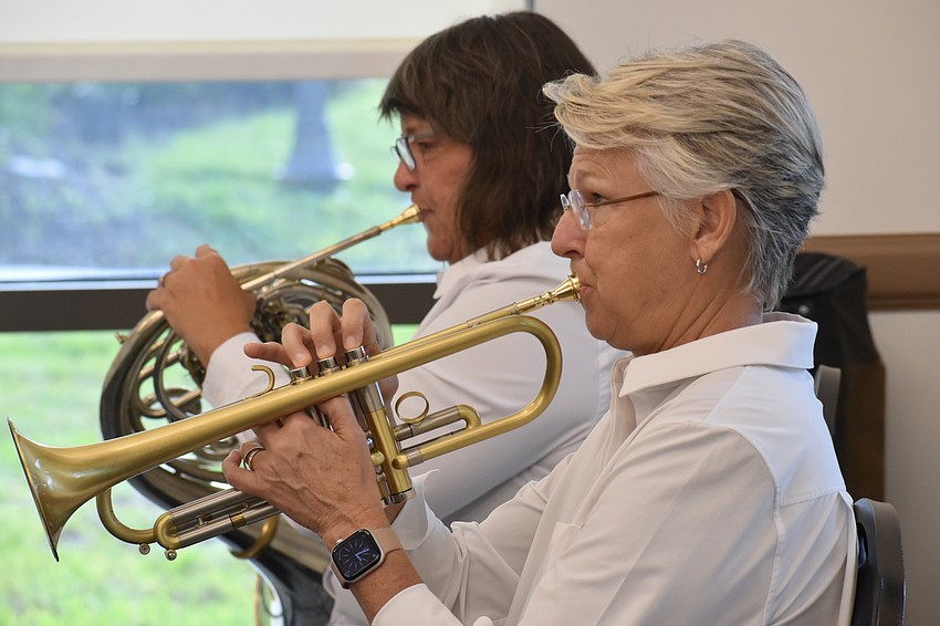 Kristy Rispens and Julie Waters of Braden River Brass perform during the ceremony.