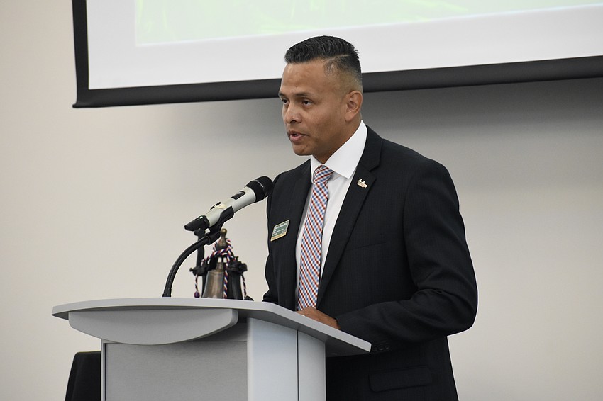 Carlos Moreira, Director for Campus Engagement for Veteran Success at USF Sarasota-Manatee, addresses attendees.