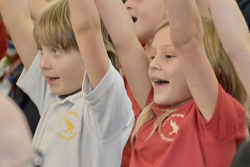 Christian Heater and Ireland Patterson of Saint Stephen's Episcopal School perform with the other students.