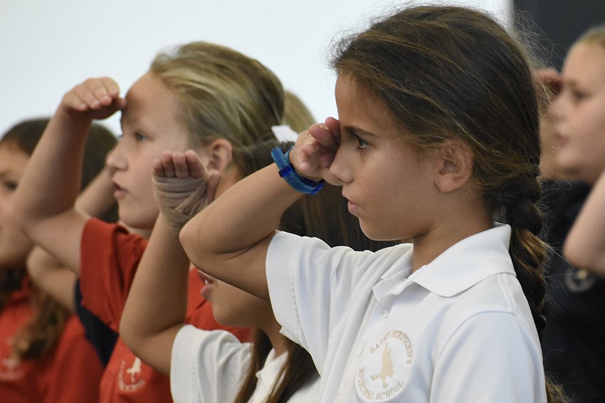 Milana Marcello and Sienna Thames of Saint Stephen's Episcopal School perform with the other students.