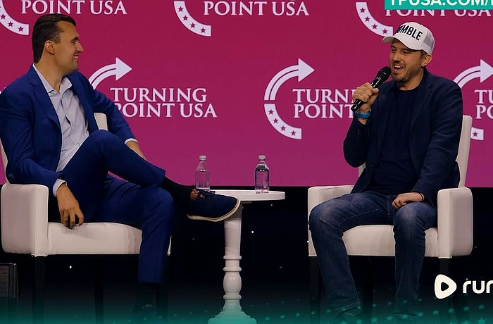 Charlie Kirk, left, and Chris Pavlovski share the stage at a Turning Point USA event. Pavloski, chairman and CEO of the video platform Rumble, said Kirk was an early investor in Rumble and played a large part in bringing Rumble's headquarters to Longboat Key.