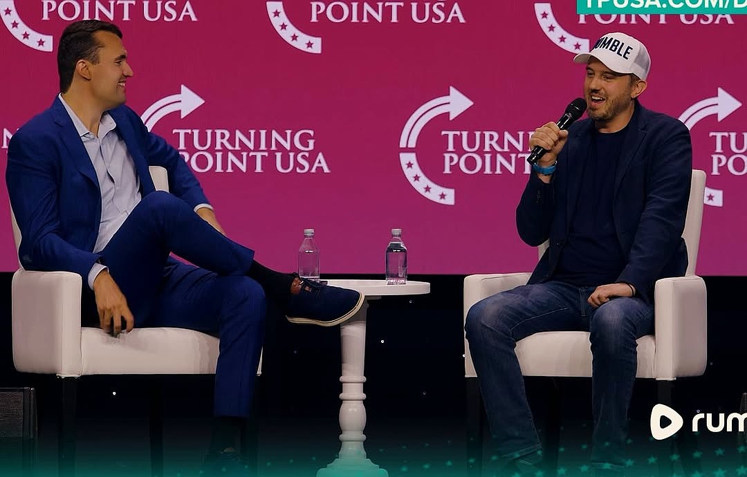 Charlie Kirk, left, and Chris Pavlovski share the stage at a Turning Point USA event. Pavloski, chairman and CEO of the video platform Rumble, said Kirk was an early investor in Rumble and played a large part in bringing Rumble's headquarters to Longboat Key.