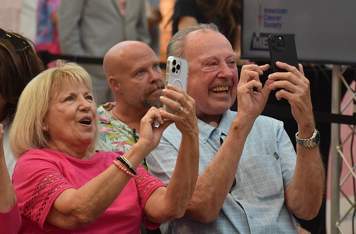 Siesta Key's Linda and Larry Keefe attend the Men Wear Pink event to support Pete Vosler of First Physicians Group, who lost both of his grandmothers to cancer.