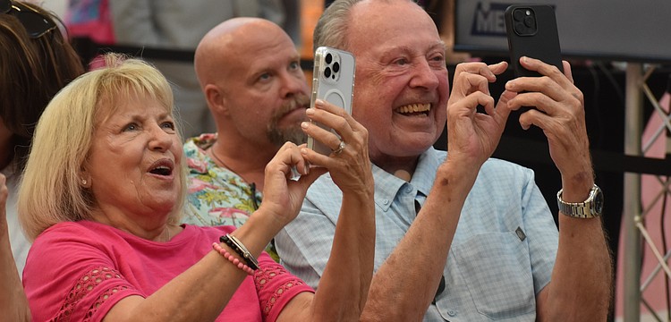Siesta Key's Linda and Larry Keefe attend the Men Wear Pink event to support Pete Vosler of First Physicians Group, who lost both of his grandmothers to cancer.