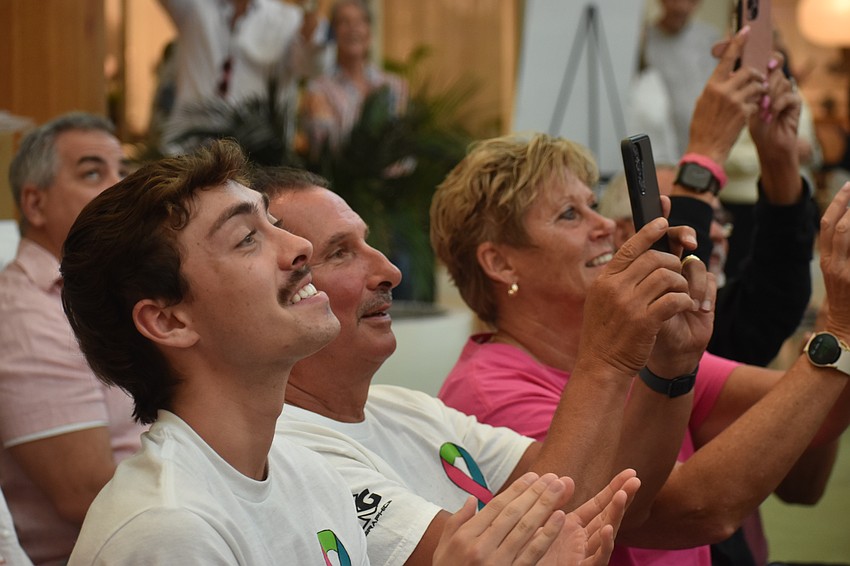 During Justin Whitman's part of the fashion show, he dances in honor of his late sister Alicia Shekerd. His best friend Joey Saviano and his parents Doug and Leslie Whitman cheer him on from the audience.