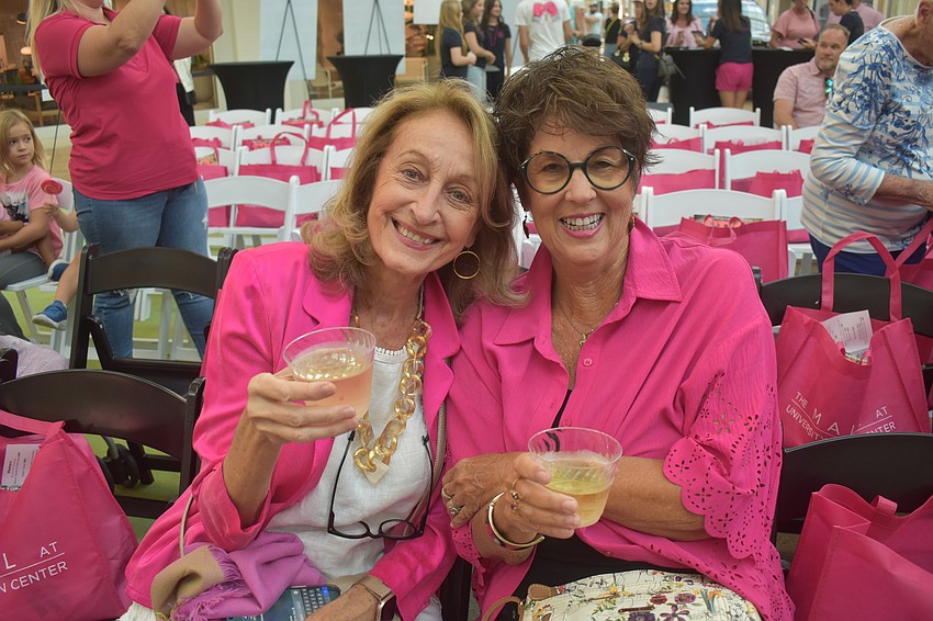 Lakewood Ranch residents Monique Govostes and Jane Bruyer attend the Mean Wear Pink event at The Mall at University Town Center.