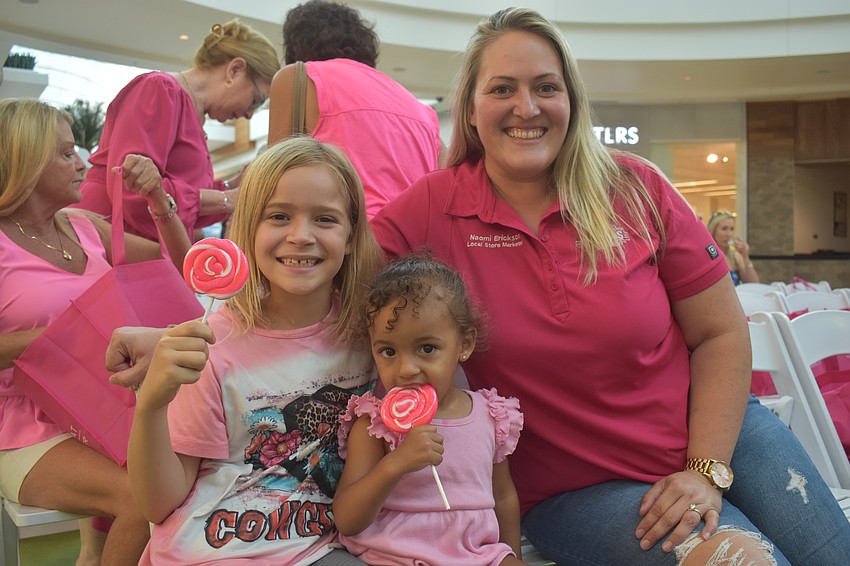 Chloe Erickson, 7, Ivy Grace, 1 and Naomi Erickson come to the show to support Spencer Allen. Allen was part of the show to honor his previous boss Krystal Irwin, who lost her battle to cancer.