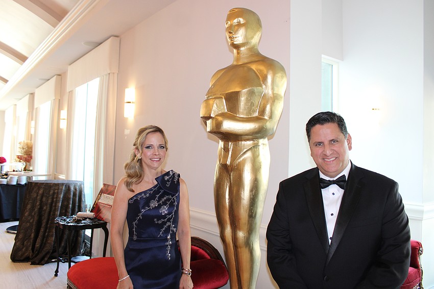 Sonia Espinel and Dr. Alfonso Espinel take some time to visit with Oscar before the gala.