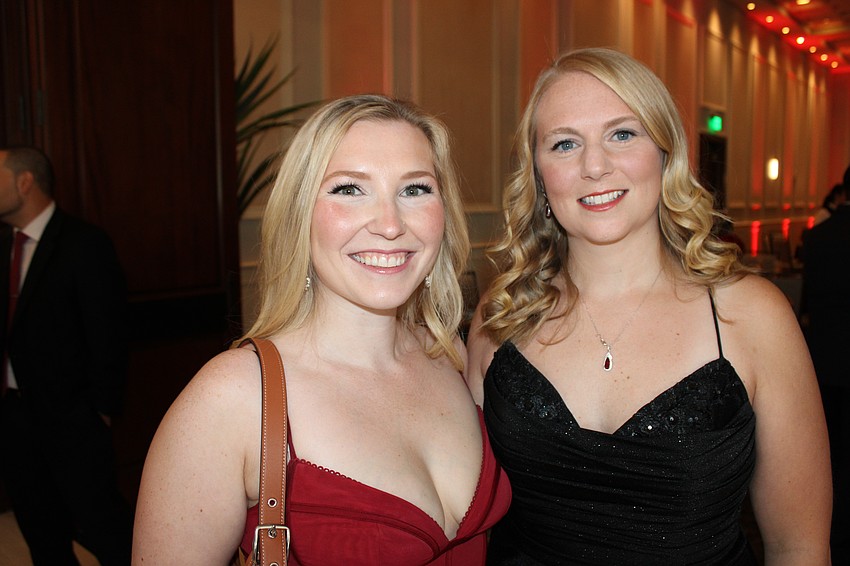 Dr. Kiley Hurwit visits with Dr. Amanda Potkovac, who both work at Cooper Family Medical, during the Manatee County Medical Society Gala at the Grove Ballroom.