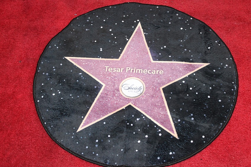 Stars on the red carpet carried the name of event sponsors.