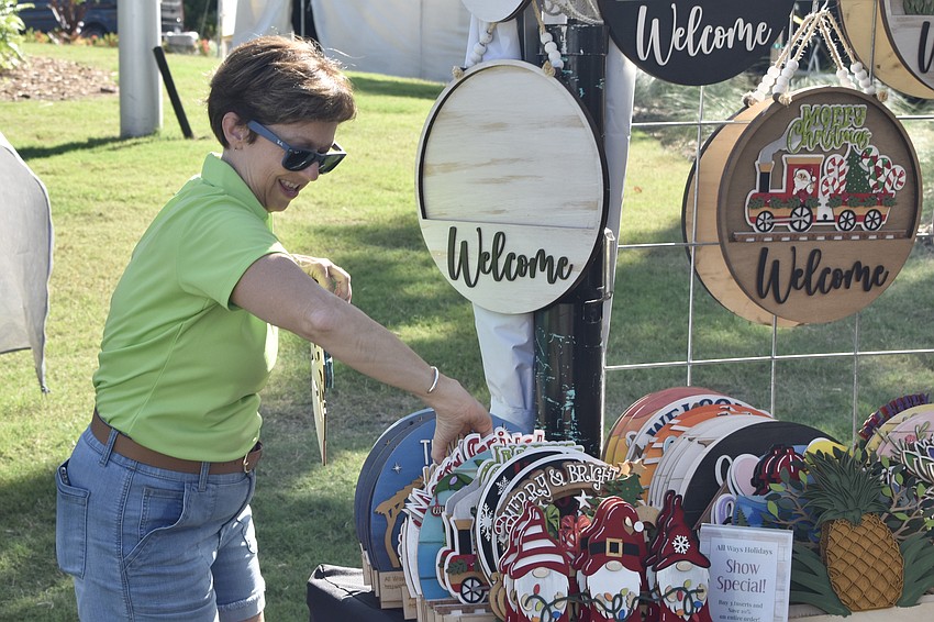 Paula Just of All Ways Holidays sets out some decor.