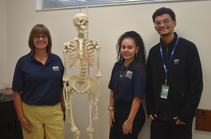 Carrie Walden, the Project Edge classroom instructor, is teaching 10 students including Mia Pardella and Justin Torres in the Project Edge program at MTC East.