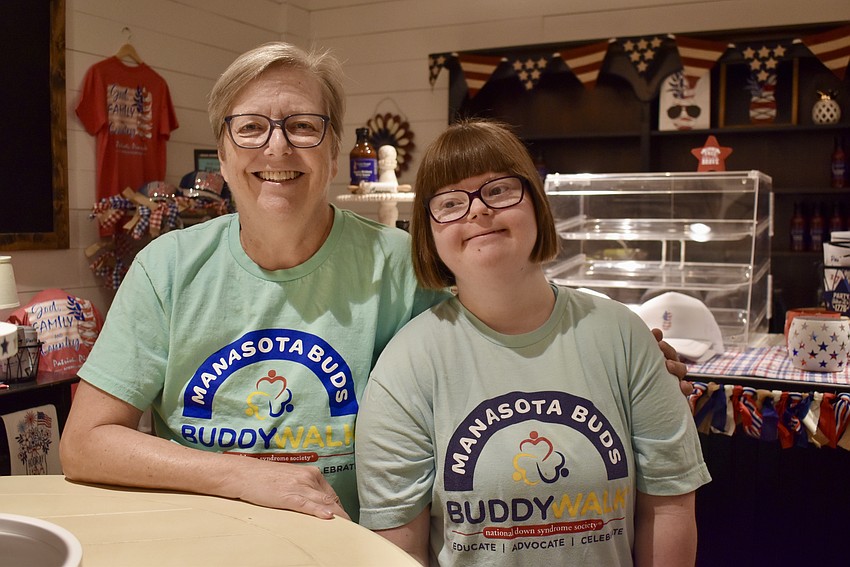 Sarasota's Pat and Rachel Crauwels volunteer at the Harvest Open House for Manasota BUDS.