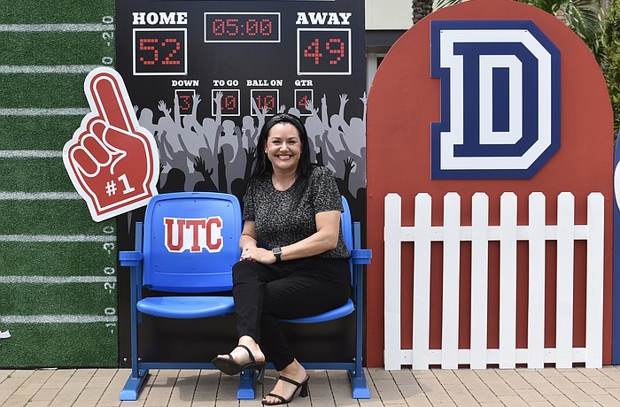 Krista Brock is the artist behind this football photo op at The Green at UTC.