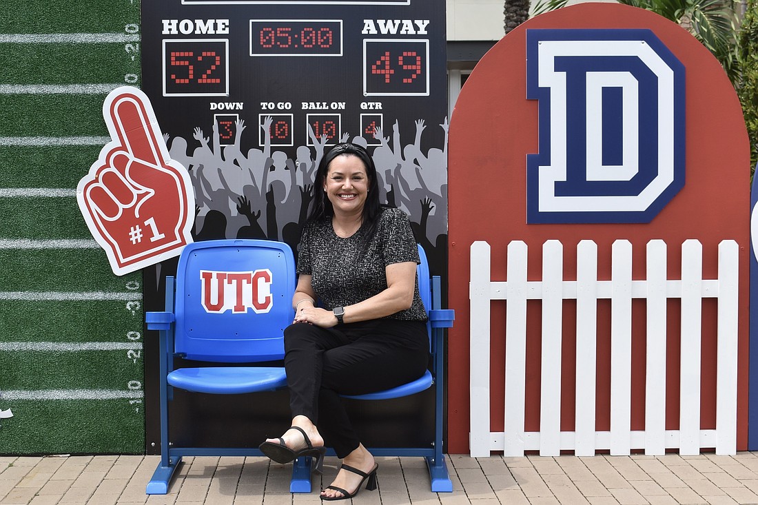 Krista Brock is the artist behind this football photo op at The Green at UTC.