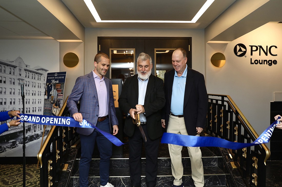 The ribbon cutting Sept. 12 for the PNC Lounge inside the Florida Theatre. From left: PNC Regional President for North Florida Chris Kalin, Florida Theatre President Numa Saisselin and Don Cameron, chair of the Florida Theatre board of directors.