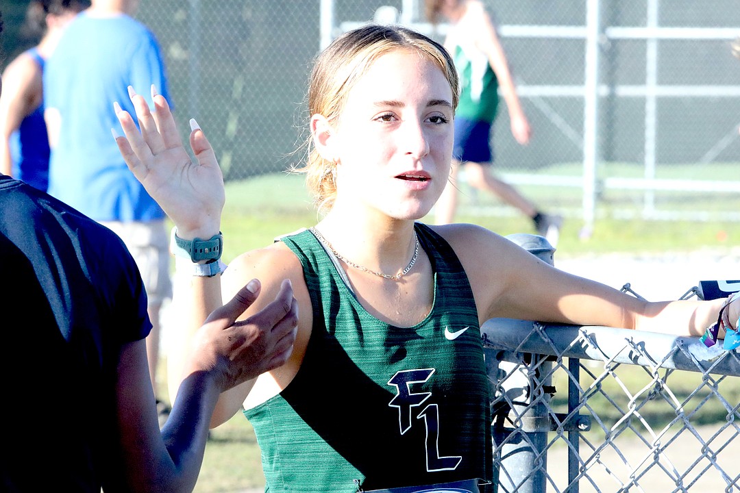 Father Lopez's Lucy Fulton shatters her PR to place third at Embry ...