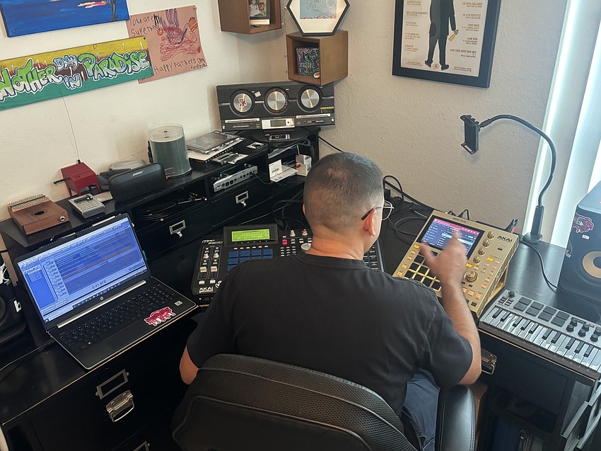 Mike Martinez works in his home studio. Phot by Abbie Pace