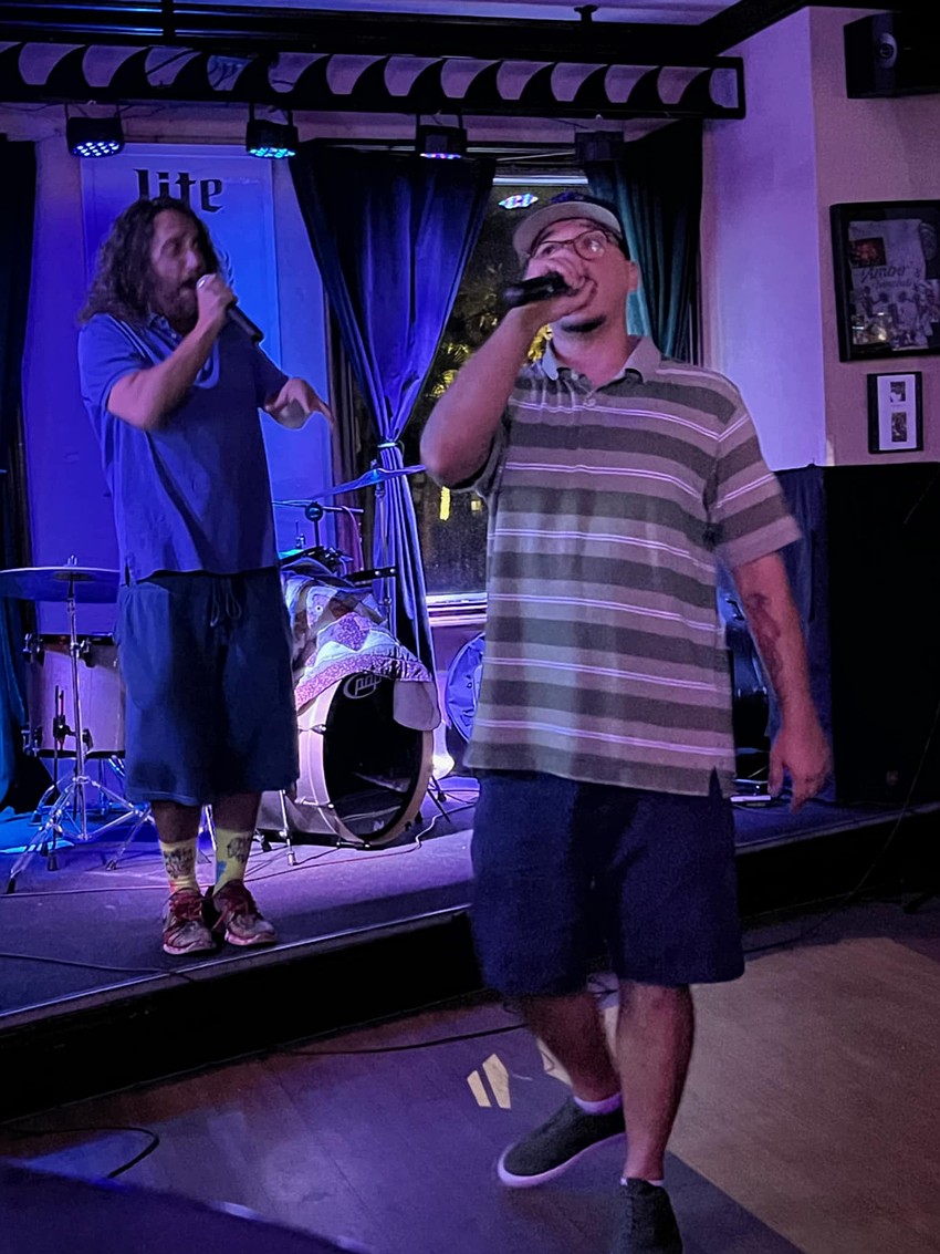 Mike Martinez (right) performs as part of rap duo Jezus Martinez at Finn’s Beachside Pub in Flagler Beach on Friday, Aug. 8. Photo courtesy of Elizabeth Martinez