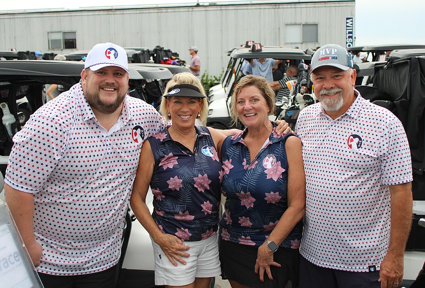 Chris McComas, Marianne Lawson, Susan Halsey and JD Lawson of MVP Vacations await the start of the Communi-tee Golf Classic at Calusa Country Club.