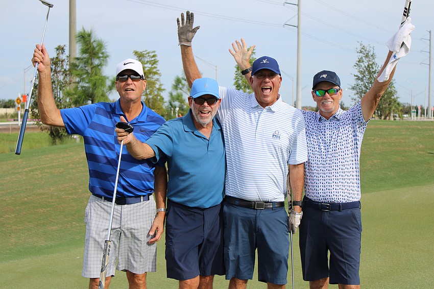 Lakewood Ranch residents Jesse Fink, Steve Block, Dave Berks and Ron Rippo participate in the first annual Communi-tee Golf Classic by Lakewood Ranch Community Activities.