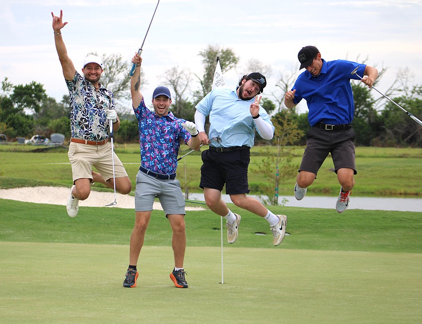Alex Houston, Ben Lacina, Jack McGovern and Matt Ambrosino are self described amateur golfers. They celebrate after scoring an eagle, which means they scored in two less strokes than expected.