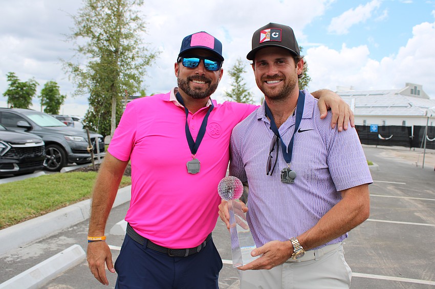 Joe Porter and Zach Sarnowski, along with Mike Harger and Greg Ramsden (unpictured) were the winners of the tournament, scoring 48 points.