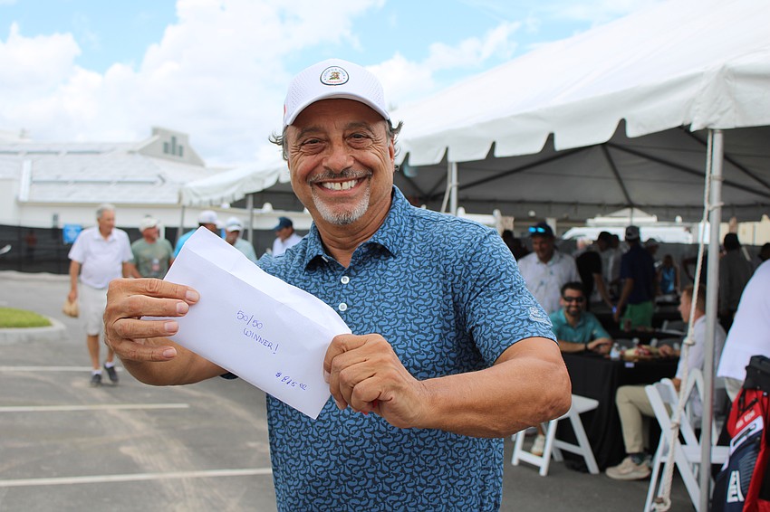 Tony Brinsisi is going home with $865 after being drawn as the 50/50 lottery winner. The other 50% of the raffle money goes towards future Lakewood Ranch Community Activities events.