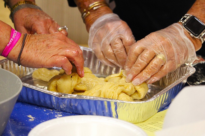 While bakers can make many styles of challah, workshop attendees made round braided loaves on Sept. 18 at Temple Beth Israel to celebrate Rosh Hashanah.