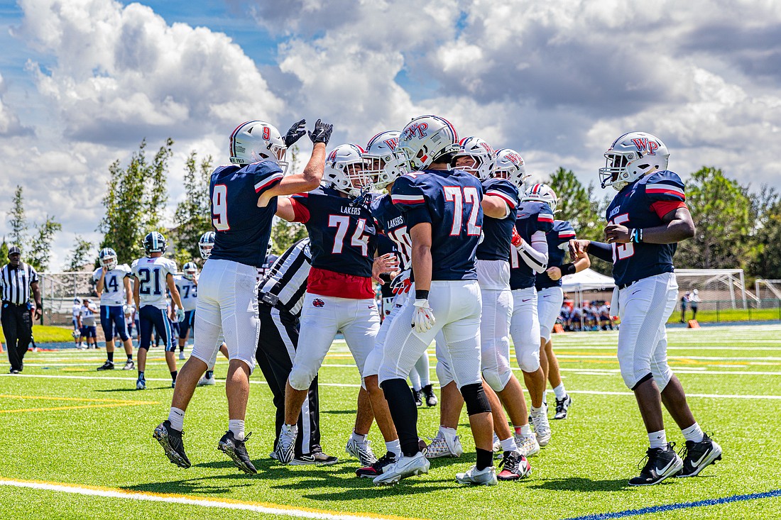 Windermere Prep celebrated against Marco Island Academy in its first home game this season.