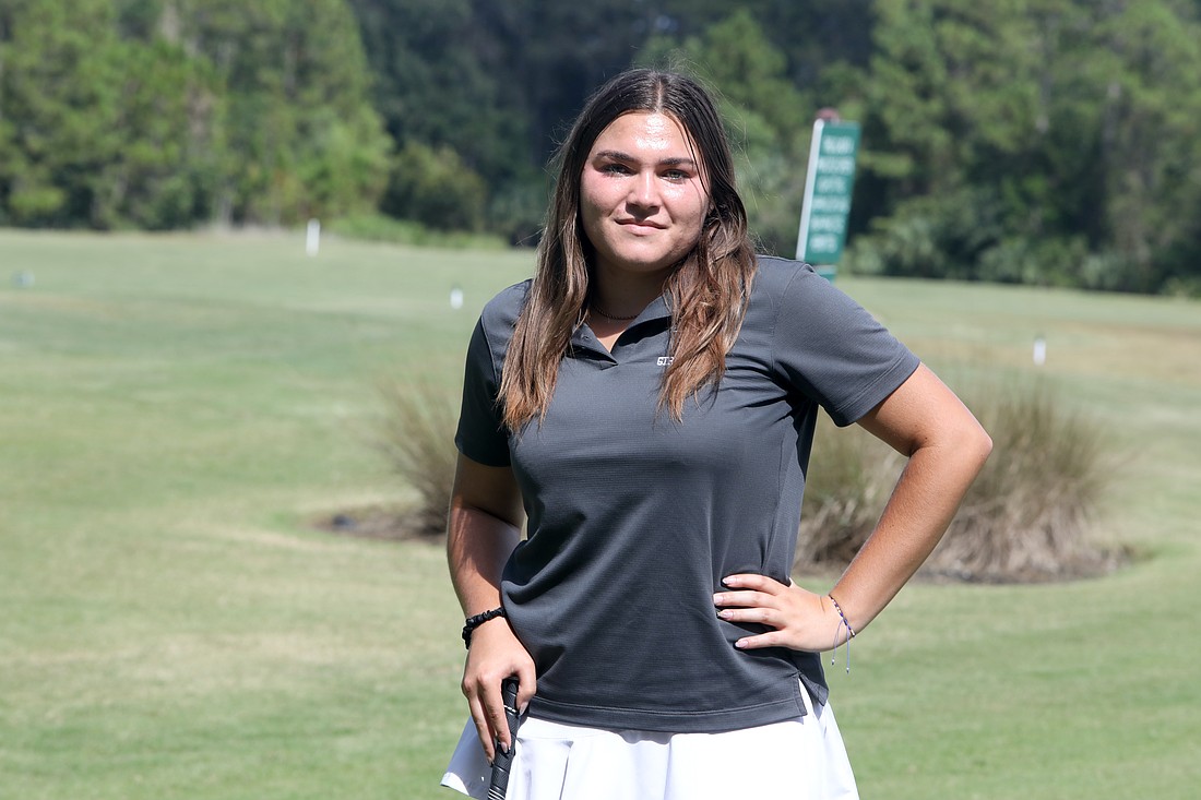 After placing at the high school state tournaments — in two different states — as a freshman, Sophia Stiwich quit golf for two years. Now she's playing better than ever. Photo by Brent Woronoff
