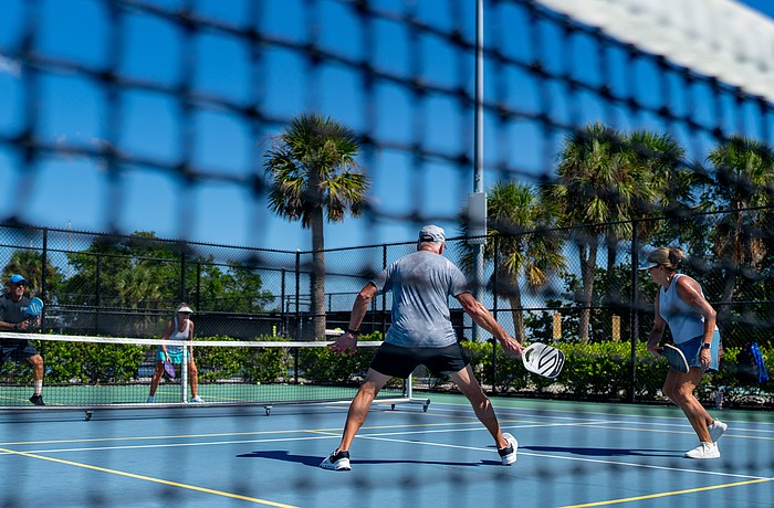 From left to right: Chris Vito, Penny Sellers, Dave Boone and Cathy Boone play a game of pickleball at the multipurpose Bayfront Park courts in Longboat Key Friday, Sept. 19.