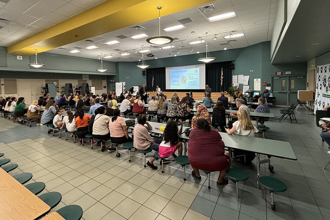 Parents, teachers and community members gather in the cafeteria Sept. 18 to voice concerns in a school district-led meeting.