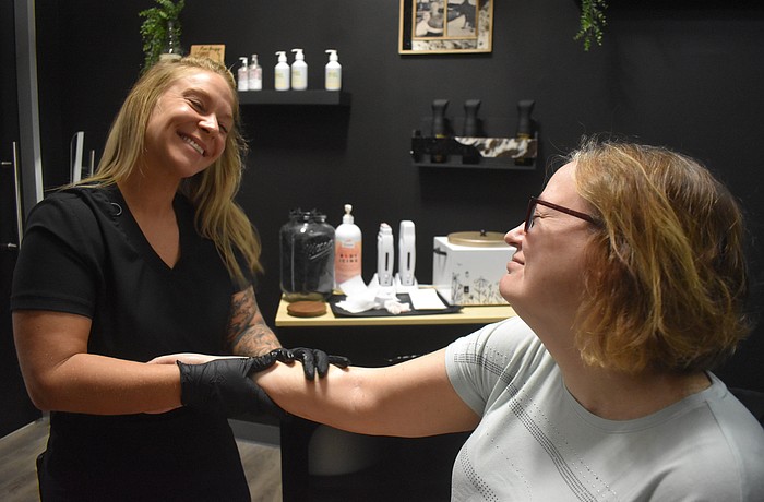 Waxing Bye Felicia opened on Sept. 22, and owner Felicia Michaels began her day waxing the arms of one of her past clients, Stacey Oaster. Oaster drove nearly two hours for her services and says she plans to continue to do so.
