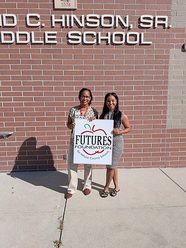 FUTURES Foundation Assistant Director Stephanie Parks and a Hinson Middle School teacher. Courtesy photo