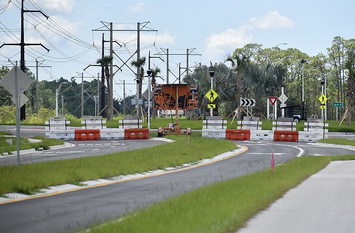 The barricades heading north on Lena Road from the roundabout at 44th Avenue East will be removed Oct. 1.