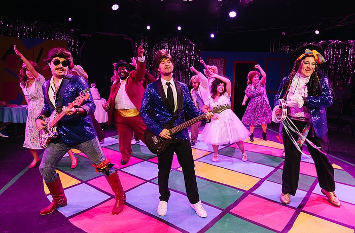 The band gets the crowd rockin' on the dance floor in The Sarasota Players' "The Wedding Singer," which runs through Oct. 5.