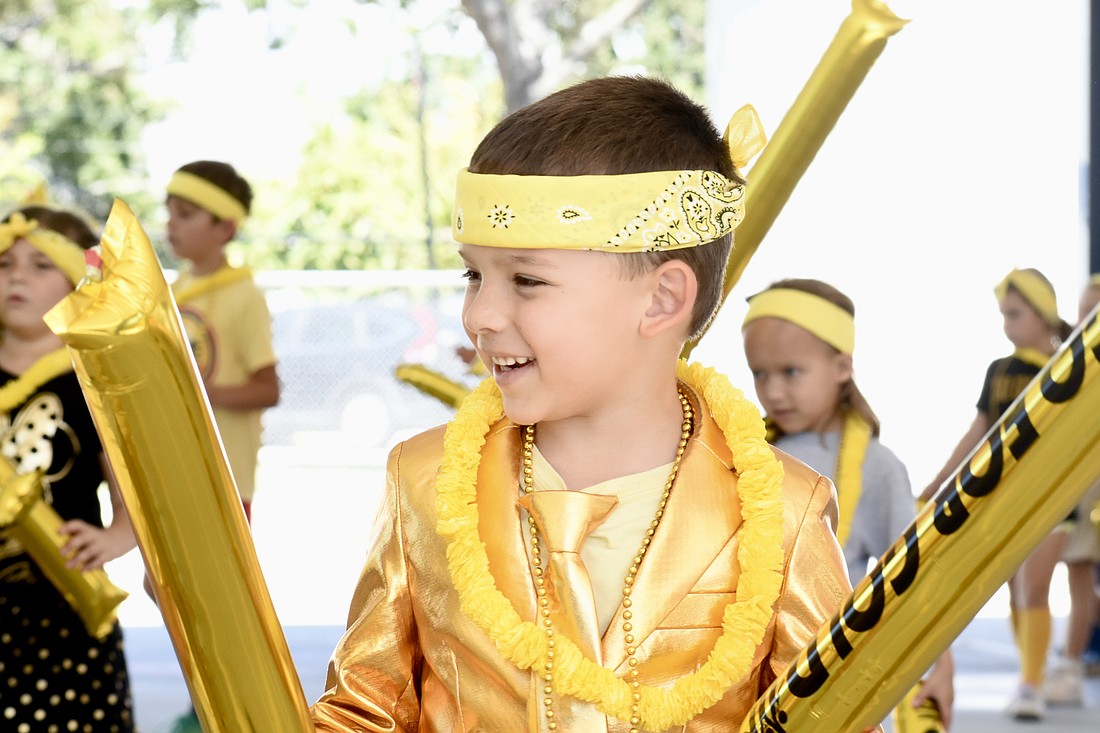 Leo Biter enters the pep rally.