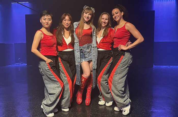 For the "TTYL" music video, Em Godfrey, Alicia Tom, Olivia Millin, Tori Vincent and Michelle Figueiredo danced in two locations with four costume changes. The dancers were from Koresh Dance Company.
