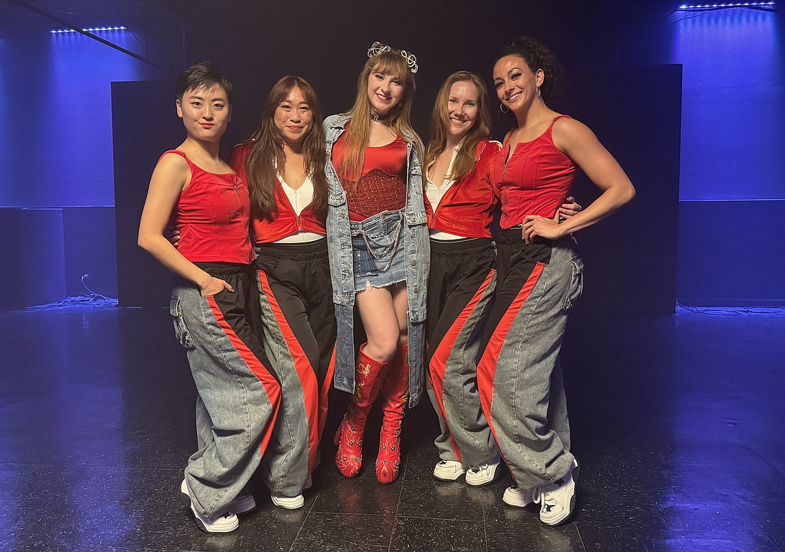 For the "TTYL" music video, Em Godfrey, Alicia Tom, Olivia Millin, Tori Vincent and Michelle Figueiredo danced in two locations with four costume changes. The dancers were from Koresh Dance Company.