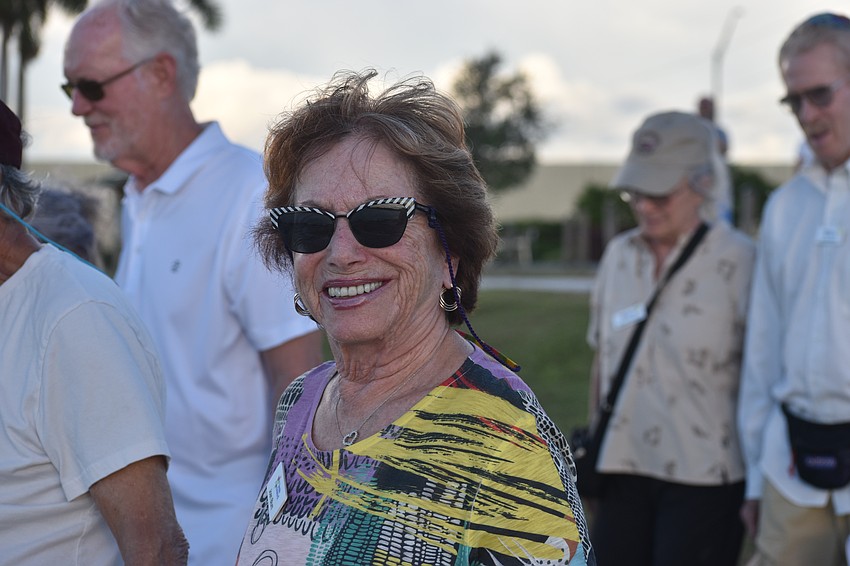 University Park's Joan Blume makes her way towards the water to cast her sins for the Temple Emanu-El Tashlich ceremony.