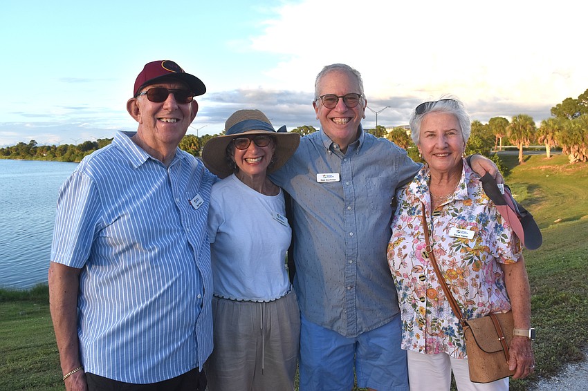 Steve Walzer, Holly Fisher, Saul Zuchman and Elana Walzer attend the Tashlich ceremony by Temple Emanu-El at Nathan Benderson Park.