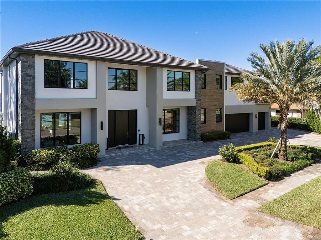 The home at 9138 Bay Point Drive, Orlando, sold Sept. 26, for $5,900,000. This home was rebuilt by Campbell Custom Homes in 2020 and is situated on a private peninsula. The sellers were represented by Maria Ubillus, Folio Realty LLC.