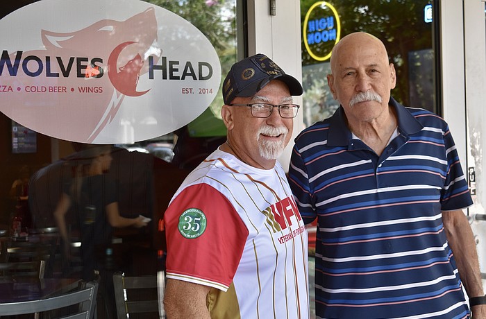 As members of VFW Post 12055, Post Commander Dave Daily and retired U.S. Army Col. Gill Ruderman meet once a month with post members at Wolveshead Pizza and Wings.