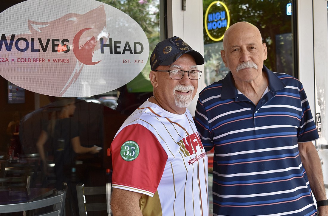 As members of VFW Post 12055, Post Commander Dave Daily and retired U.S. Army Col. Gill Ruderman meet once a month with post members at Wolveshead Pizza and Wings.