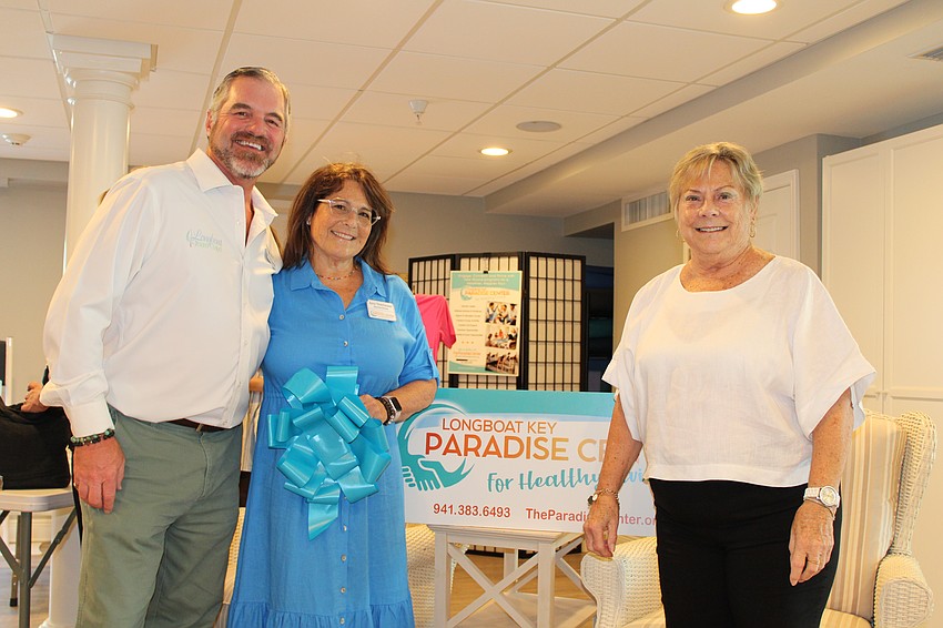 Longboat Island Chapel Rev. Brock Patterson and The Paradise Center's Executive Director Amy Steinhauser and Board President Gail Loefgren said residents can look forward to new and familiar programs at the new headquarters.